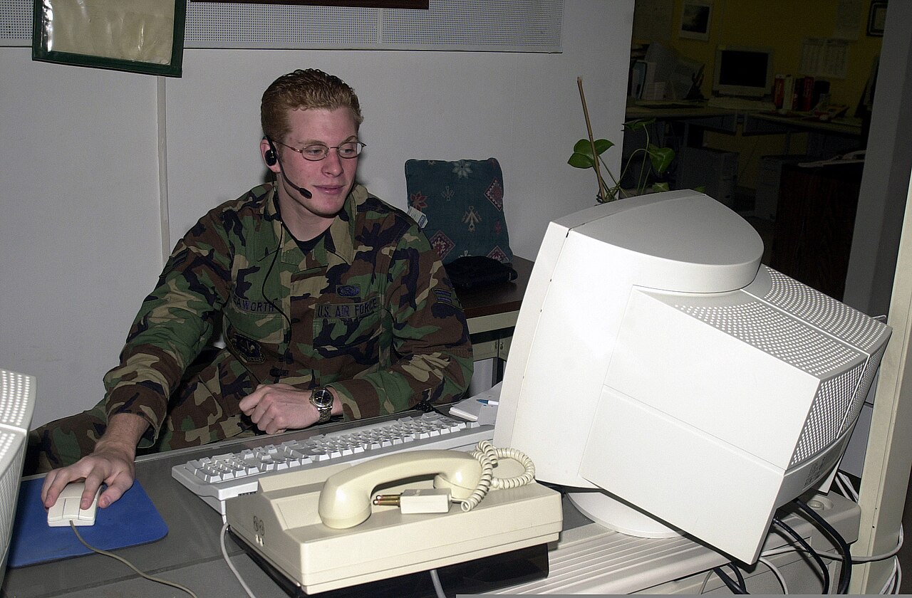 A specialist wearing a headset answers incoming calls