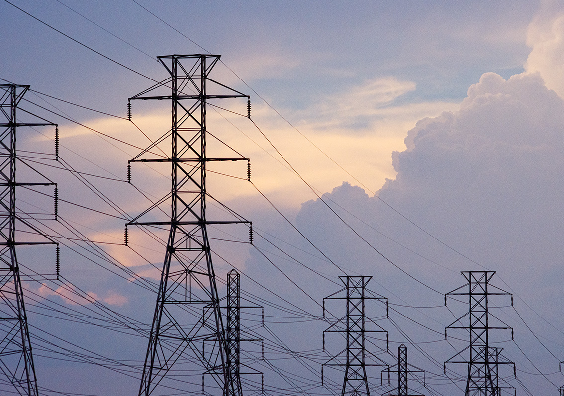 High-voltage power lines against a Texas sky