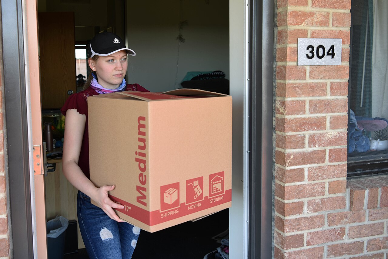 Cardboard moving boxes stacked before a move